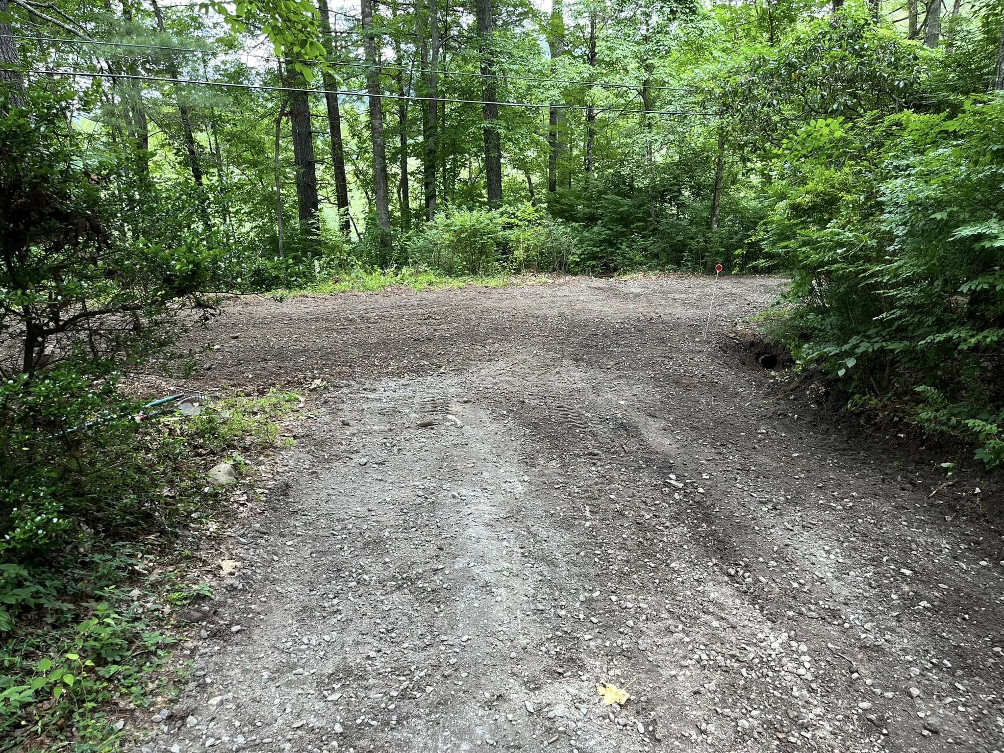 Regraded gravel access with a clean driving surface